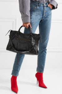 New Balenciaga City Arena on Net-A-Porter held by hand